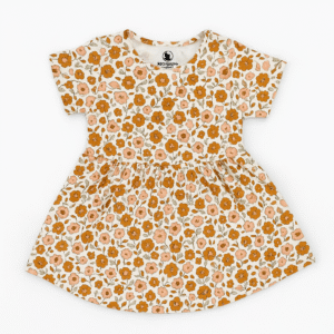 A short-sleeved children's frock with an all-over orange and peach floral print on a sand beige background.
