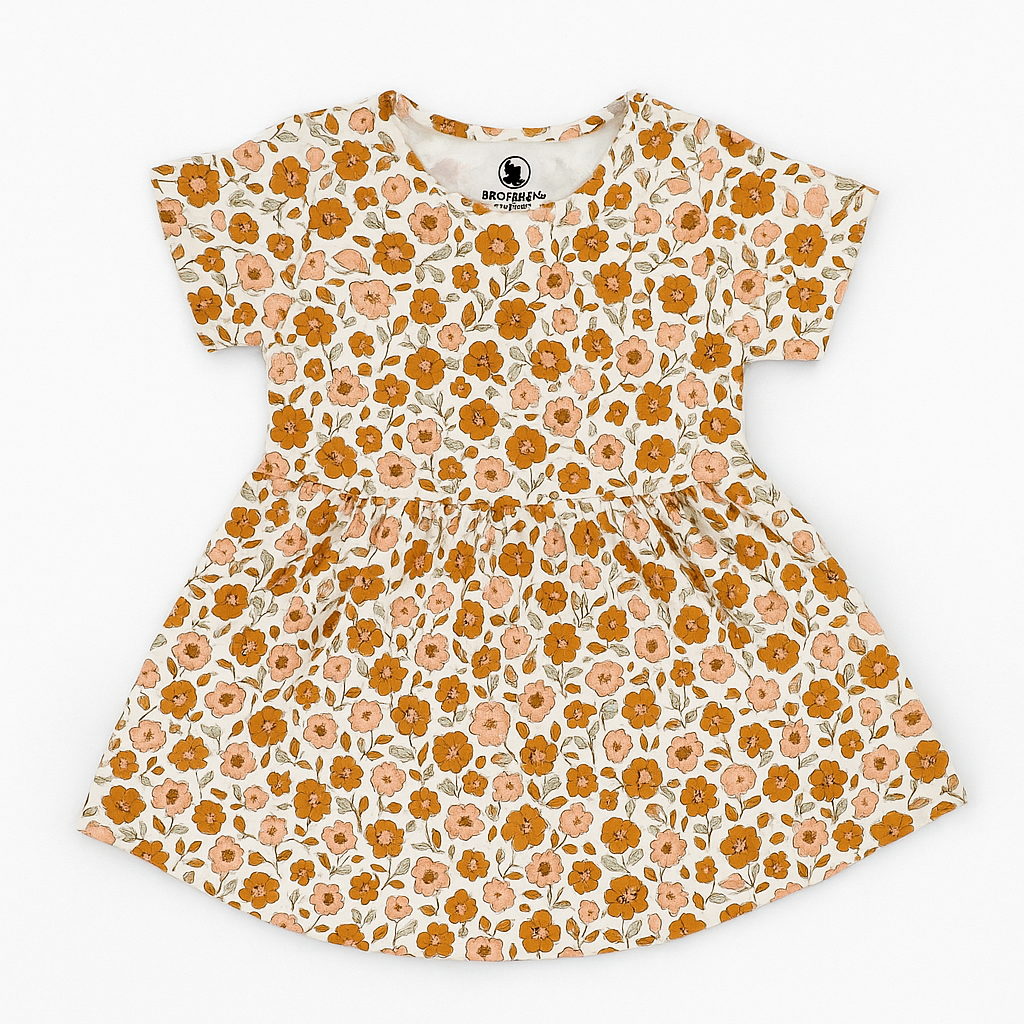 A short-sleeved children's frock with an all-over orange and peach floral print on a sand beige background.