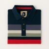 Man wearing dark blue polo shirt with horizontal multicolor stripes