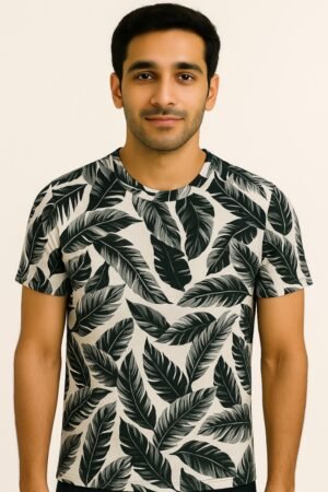Man wearing a high-quality round neck t-shirt with an all-over black leaf print on an off-white background
