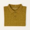 Man wearing a mustard to navy blue gradient ombre polo t-shirt with a classic collar and short sleeves