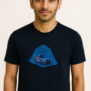 Man wearing a premium export quality dark blue t-shirt with a detailed car and monument graphic