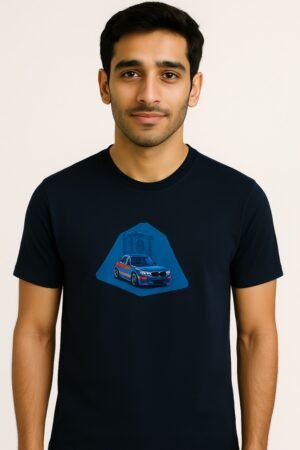 Man wearing a premium export quality dark blue t-shirt with a detailed car and monument graphic