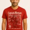 Man wearing a red Captain Morgan graphic T-shirt with "Live Like The Captain" slogan