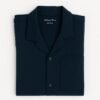 Man wearing export quality navy blue button-down shirt with front pocket and classic collar