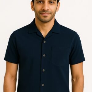 Man wearing export quality navy blue button-down shirt with front pocket and classic collar
