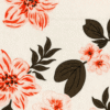 Off-white girls t-shirt with bold red floral and green leaf prints