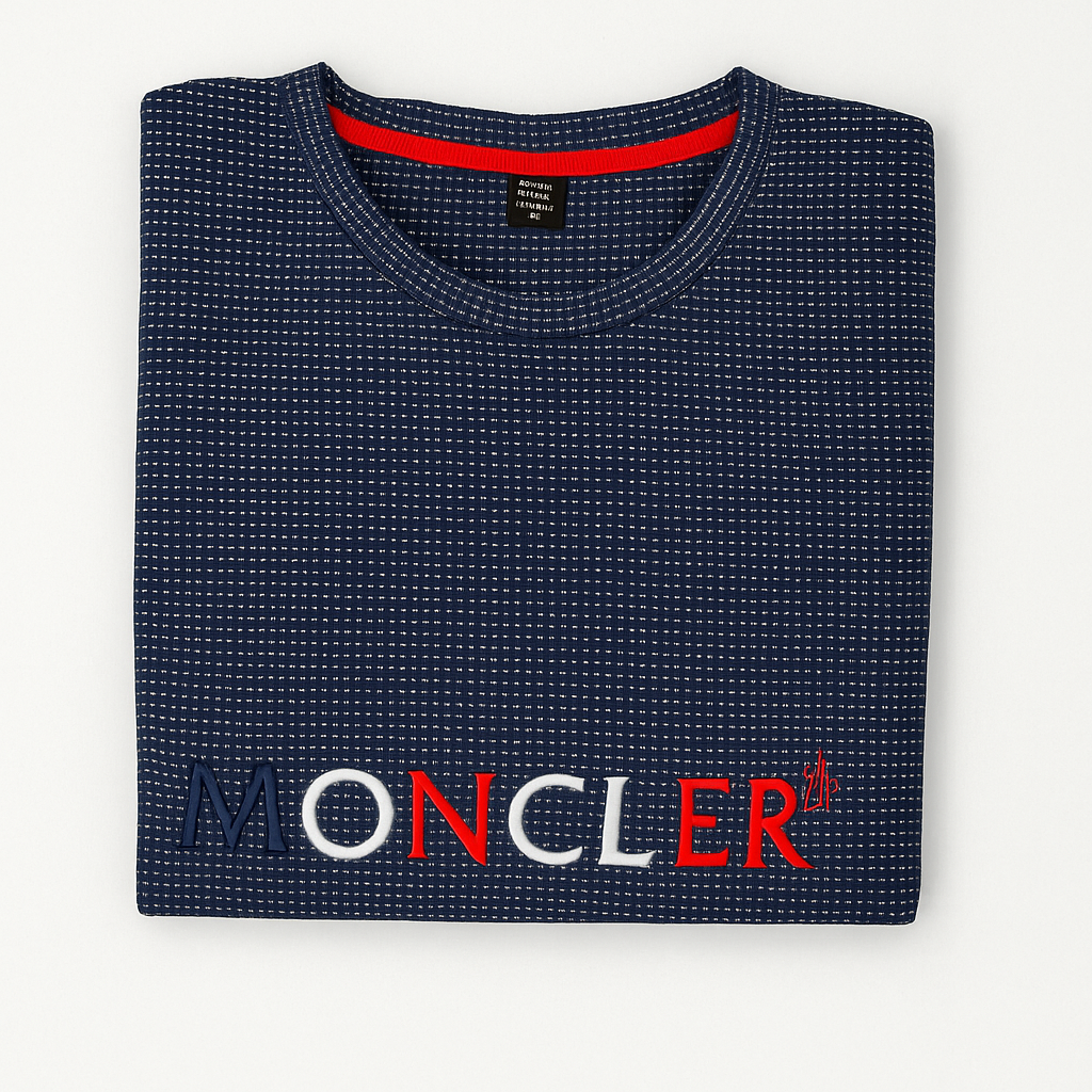 Navy Moncler t-shirt with red, white, and blue embroidered logo on chest
