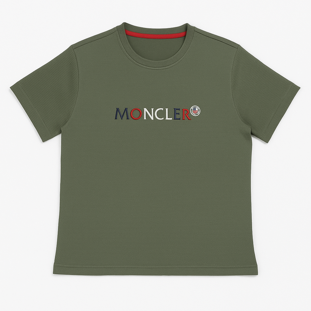 Close-up of Moncler logo embroidered on olive green textured t-shirt fabric
