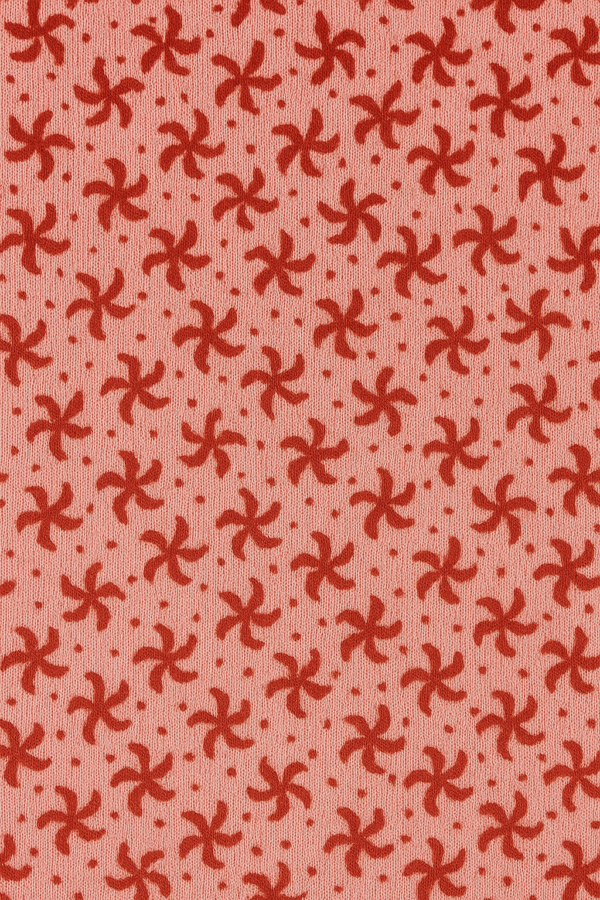 Coral pink kids’ leggings with small red floral print, elastic waistband – age 5 to 6 years