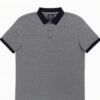 Folded grey polo shirt with small white geometric dot pattern and navy blue collar.