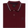 Burgundy polo shirt with white and navy collar trim and embroidered "A" logo on chest.
