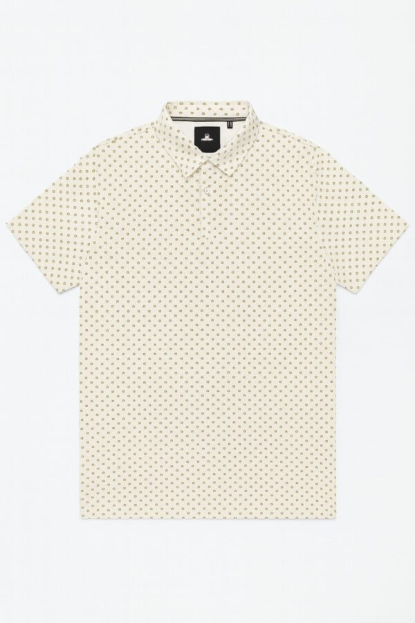Short-sleeved off-white polo shirt with gold geometric print laid flat on white background.