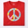 Young boy wearing a red half sleeve t-shirt with colorful peace symbol graphic