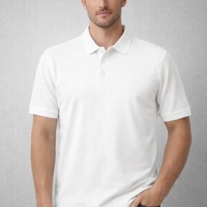 Man wearing a plain white short-sleeve polo shirt with a collar and buttons, paired with dark blue jeans, standing against a light grey background.